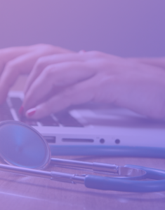 Image: A nurse uses a computer to access and manage client data while ensuring compliance with NEN 7510 standards, ensuring the security and confidentiality of patient information.